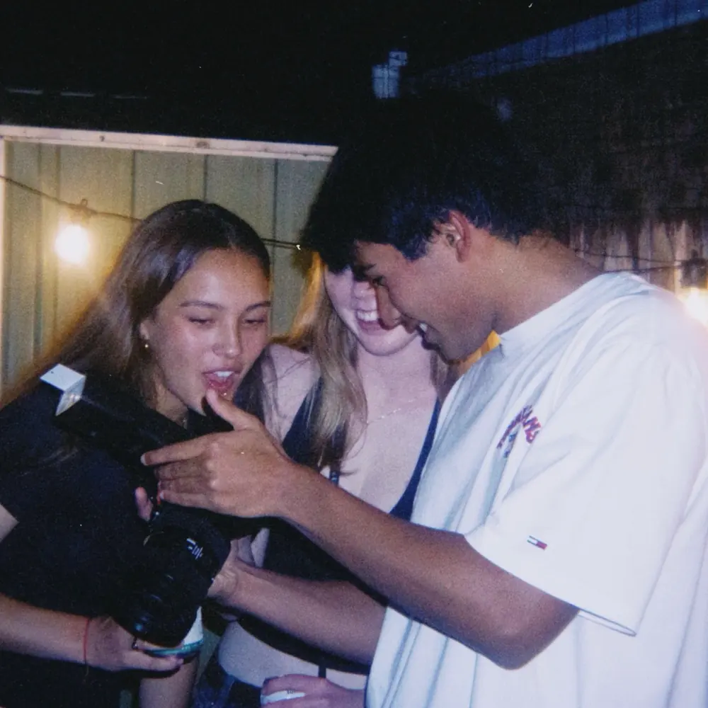Ashvin with a camera at an event