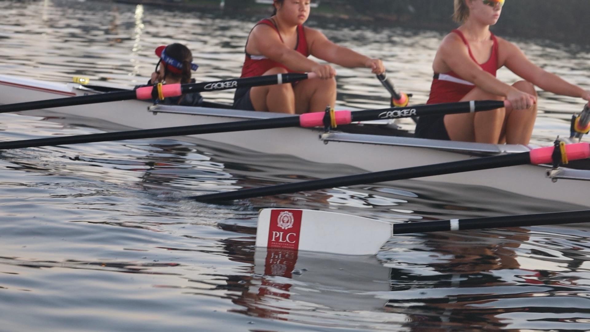 Close-up of PLC rowers on the water