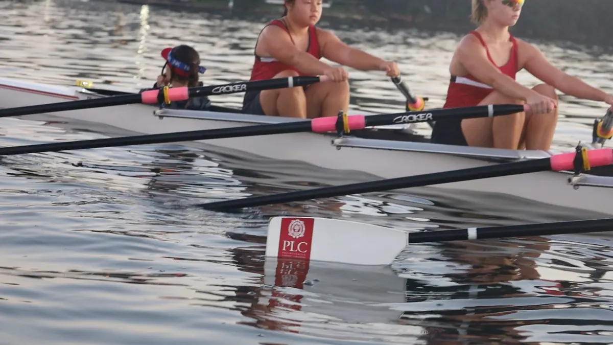 Close-up of PLC rowers on the water